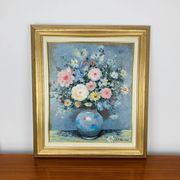 Still life painting of a bouquet of flowers, golden frame