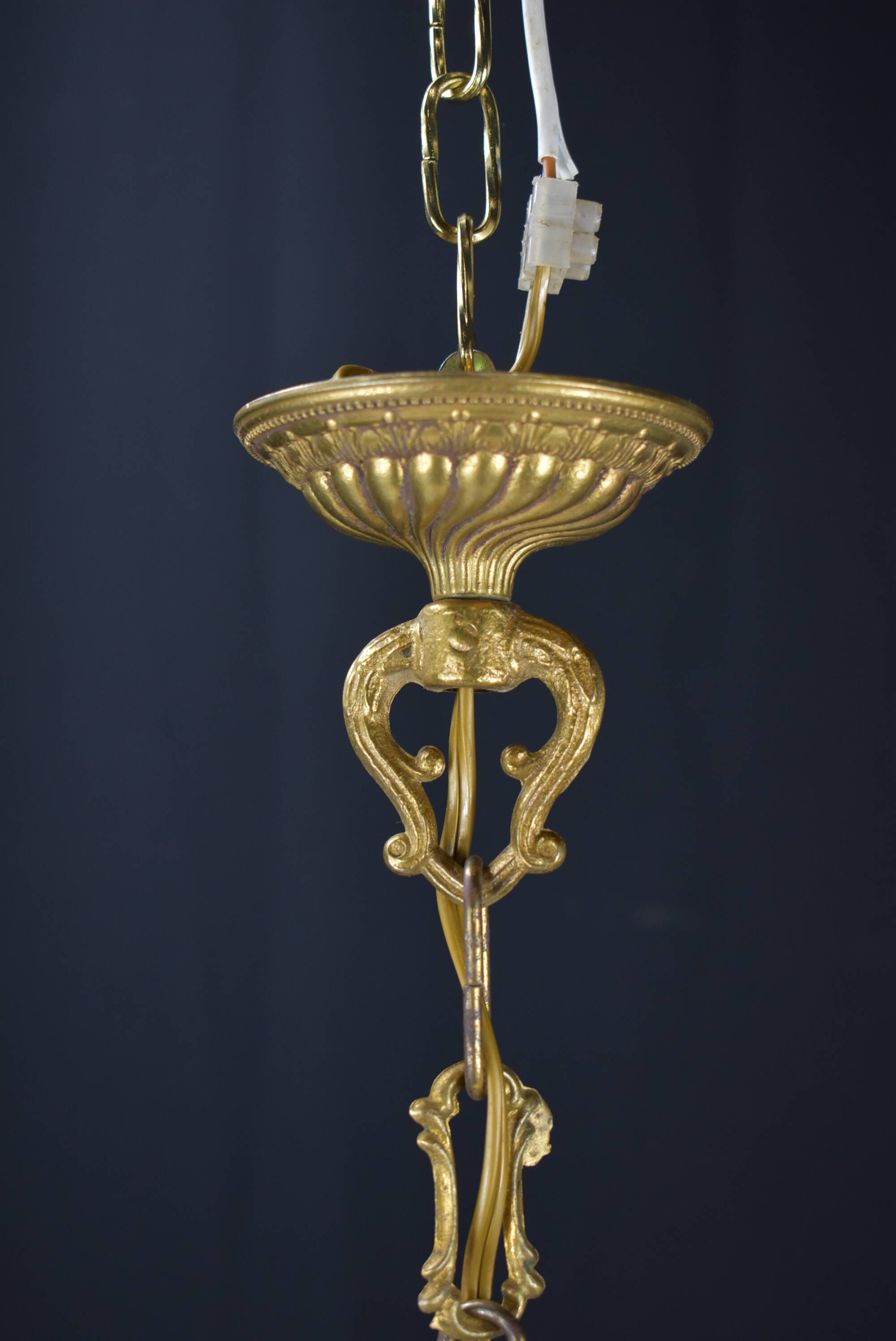 Hot air balloon chandeliers with glass tassels.