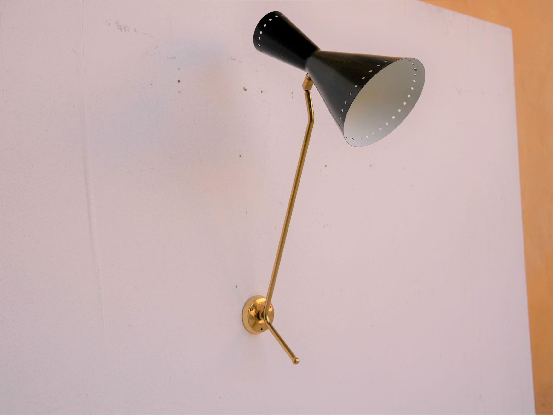 Vintage "Diabolo" wall apply in black metal and brass