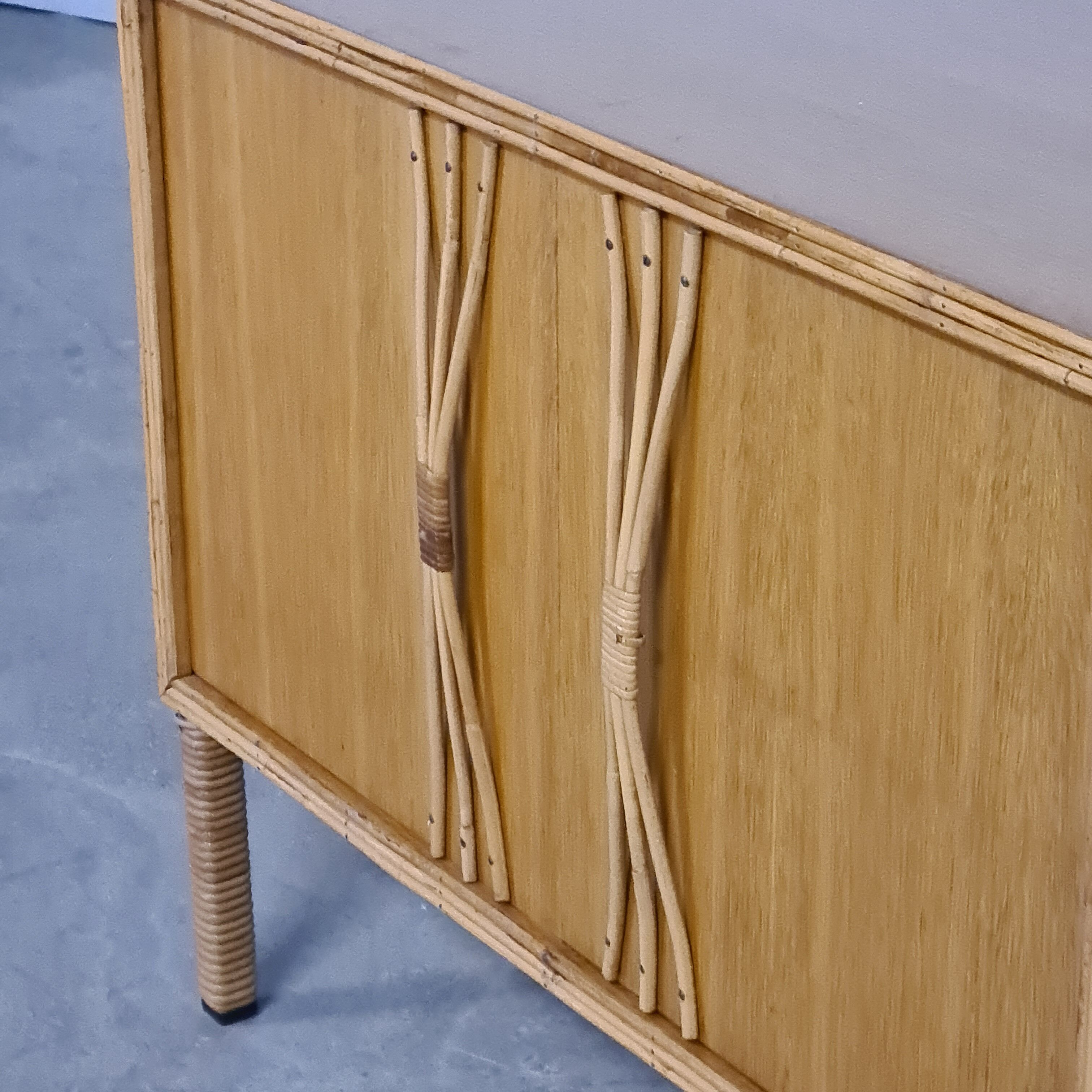 Cabinet in rattan 60s