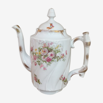 Old porcelain coffee maker or teapot