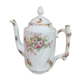 Old porcelain coffee maker or teapot