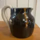 Beige and blue stoneware jug