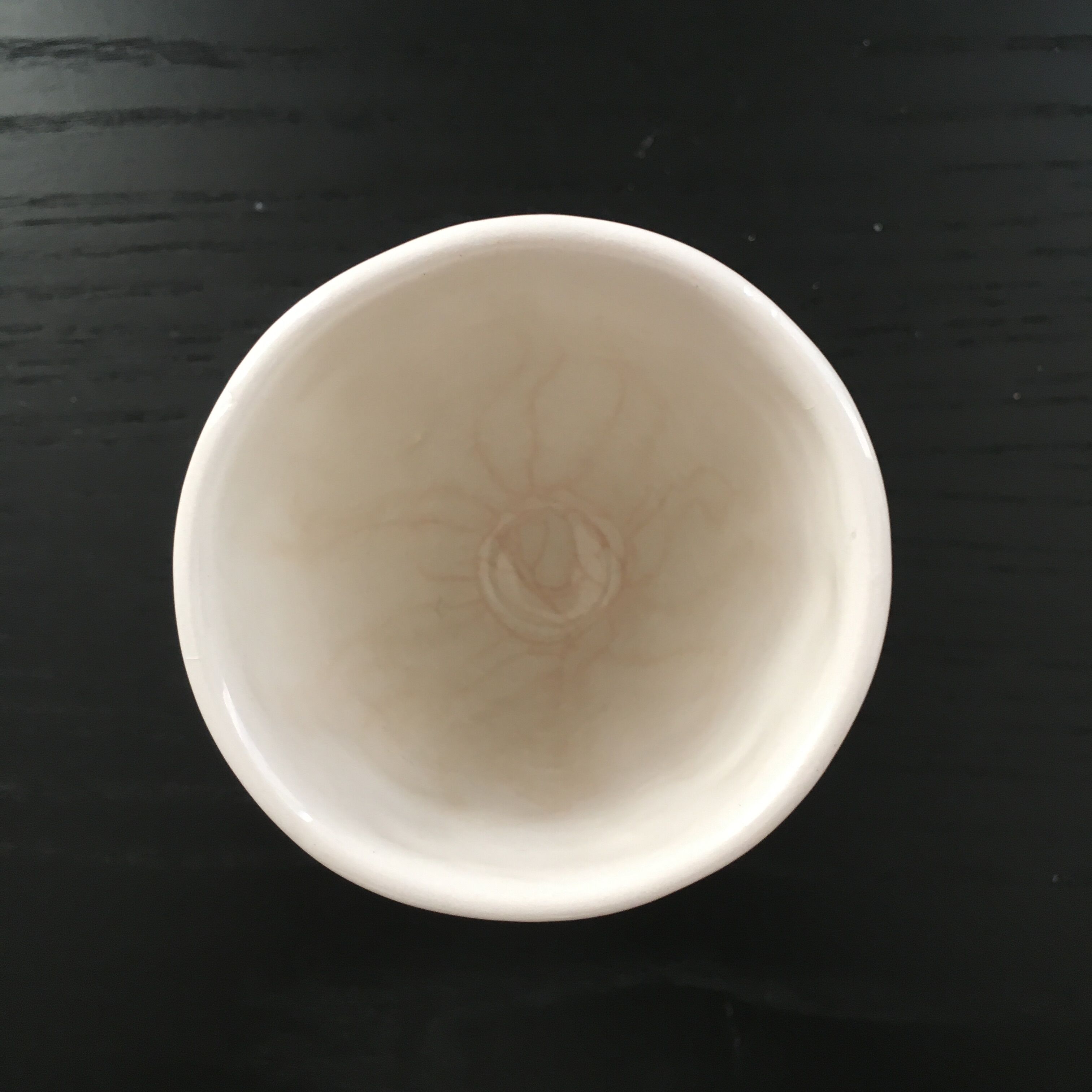 White vase with wheat decoration.