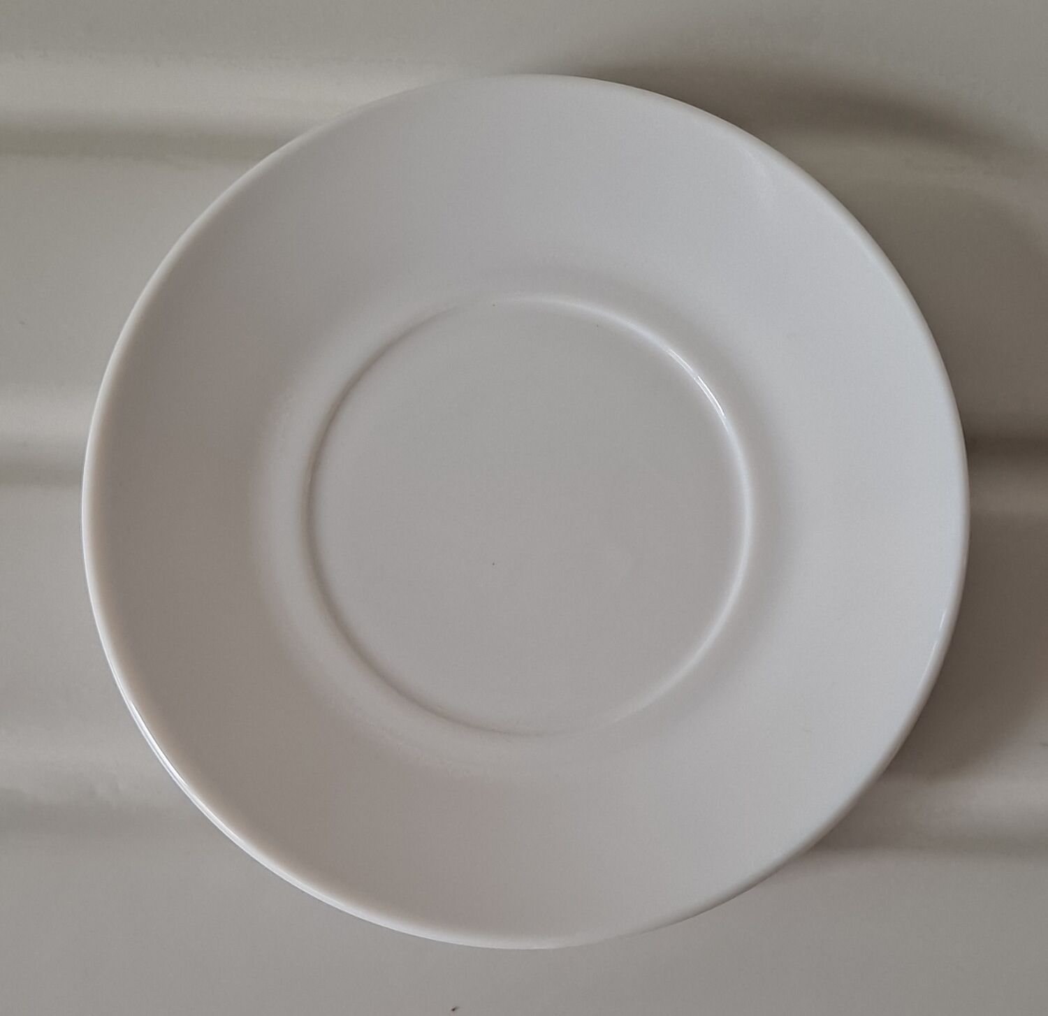 Trio of mismatched white cups