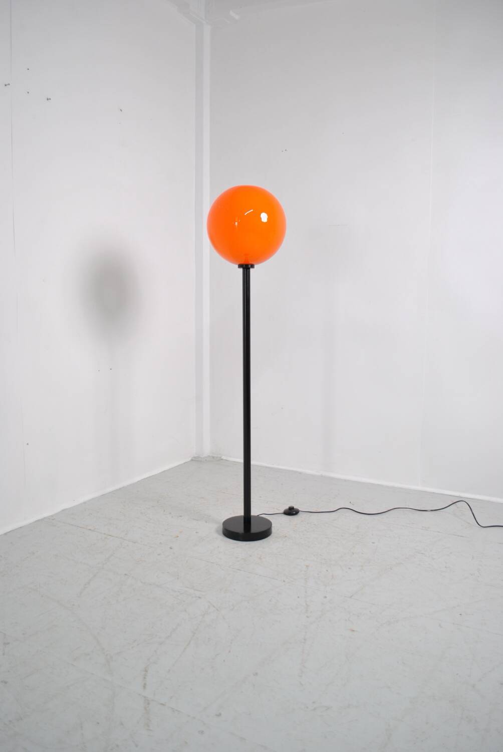 Orange globe floor lamp 1970