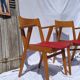 Pair of wooden armchairs and skaï foot compass of the 50s