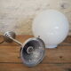 Art Deco suspension globe in white opaline with an aluminium stem.