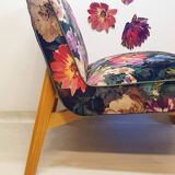 Restored armchair in varnished wood and fabric