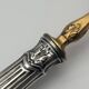 Pair of silver Minerva and vermeil shakers, 19th century.