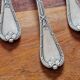 Christofle, Paris - Set of 12 fish knives - crossed ribbons model
