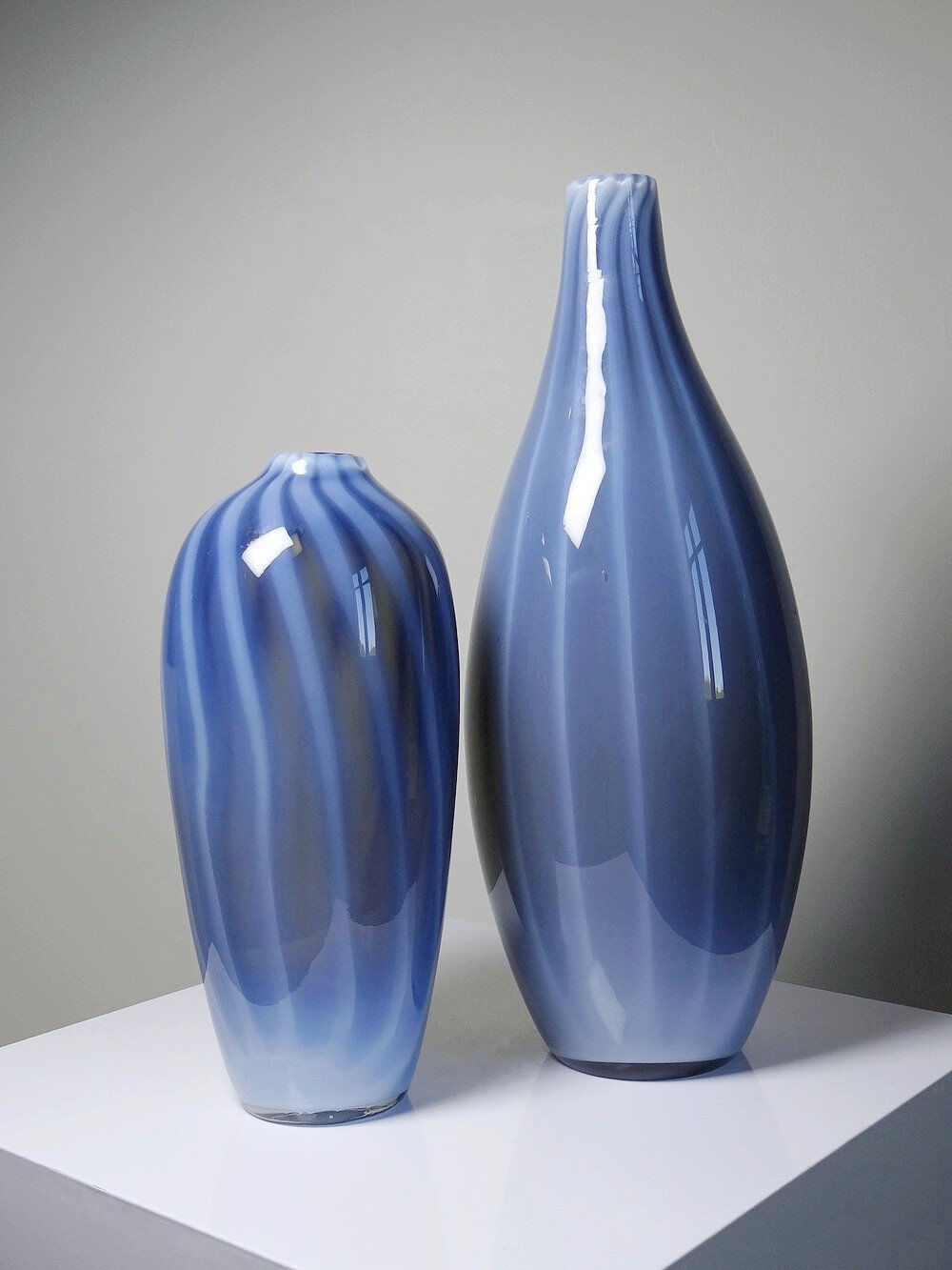 Pair of vintage smoky glass vases lined with opaline, Murano bubble glass.