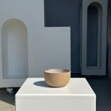 Small brown bowl inside blue and white