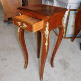 Harness in veneer and bronze