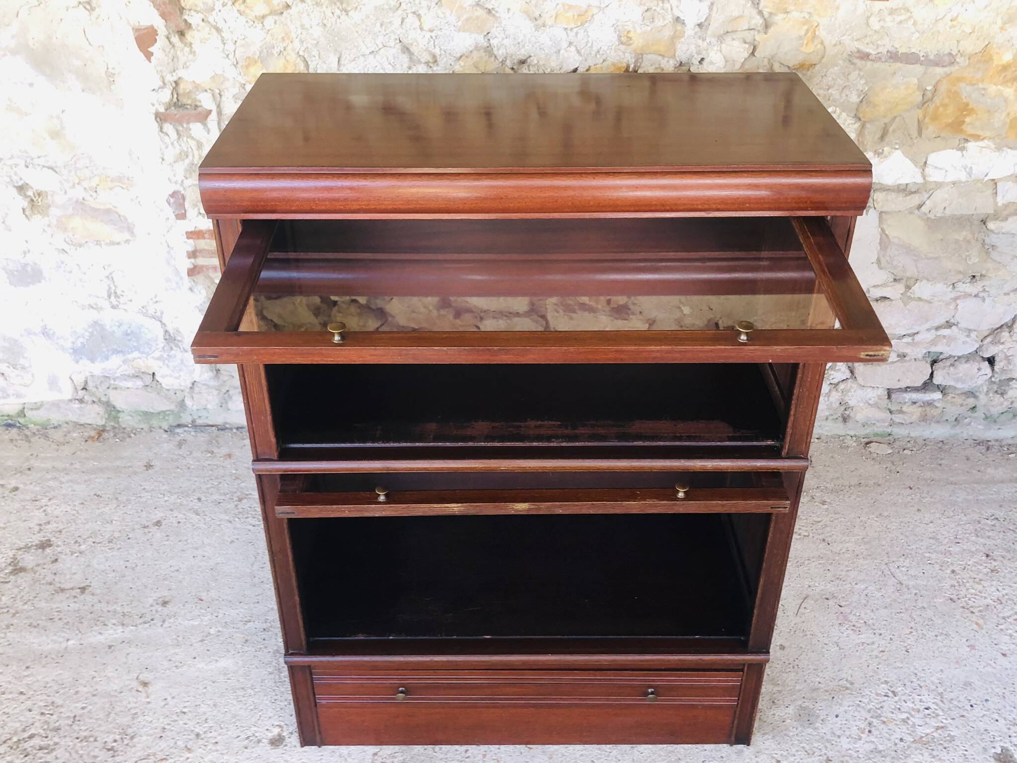 Vintage mahogany avocado bookcase with overhead glass doors circa 40's/50's