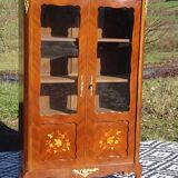Glass library with rosewood marquetry in the Louis XV style.