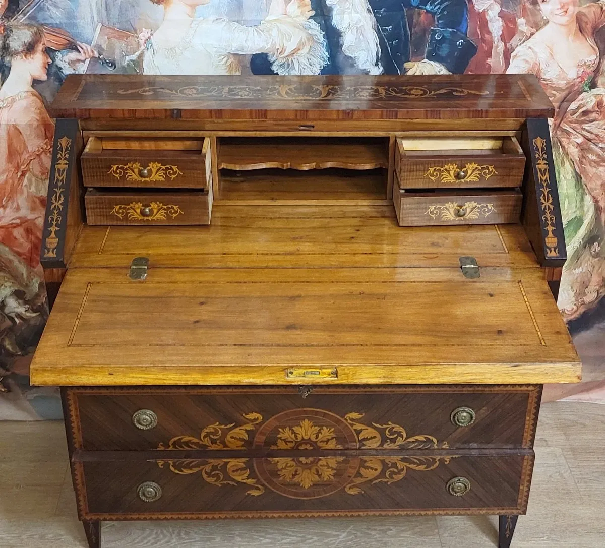 Louis XV style writing desk commode with drop-down front, made of precious wood.