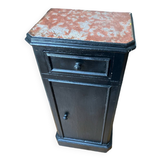 Wooden chest of drawers with red marble top