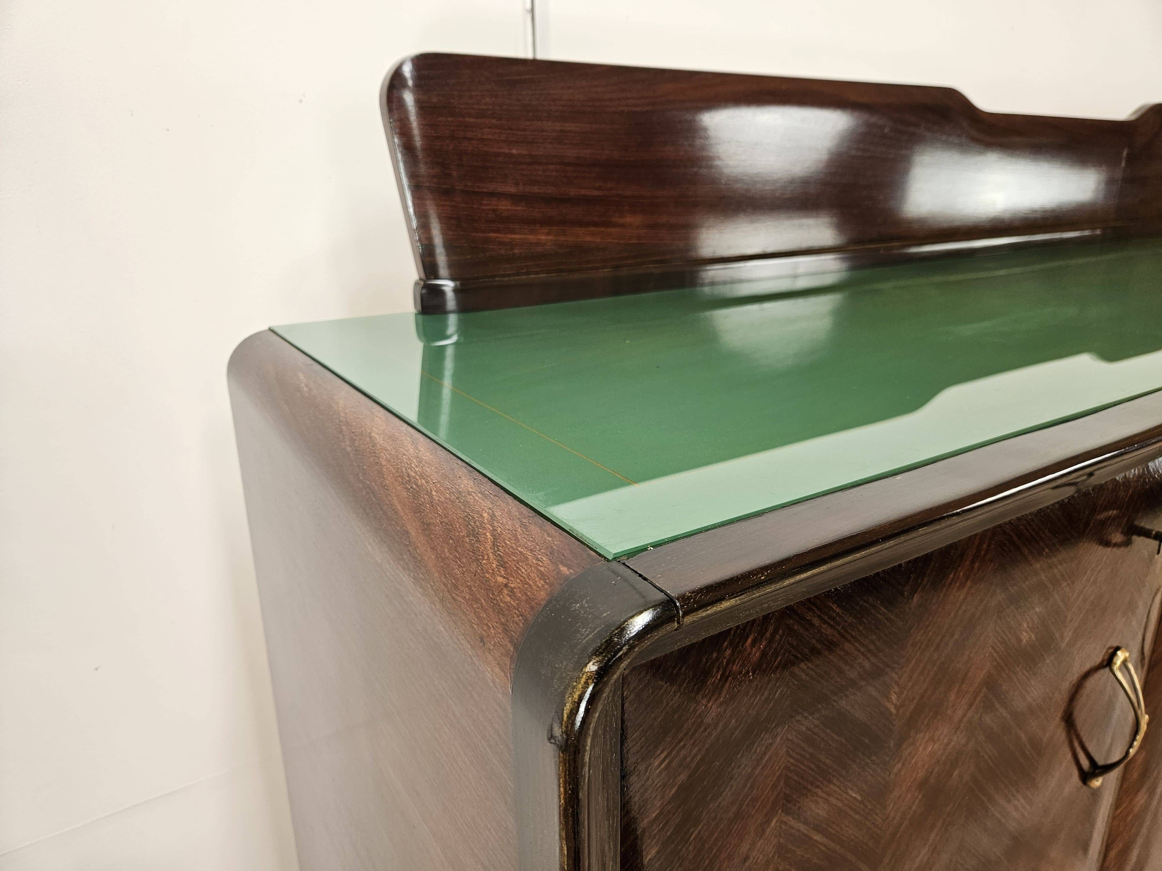 Mahogany sideboard with a glass top, 1960