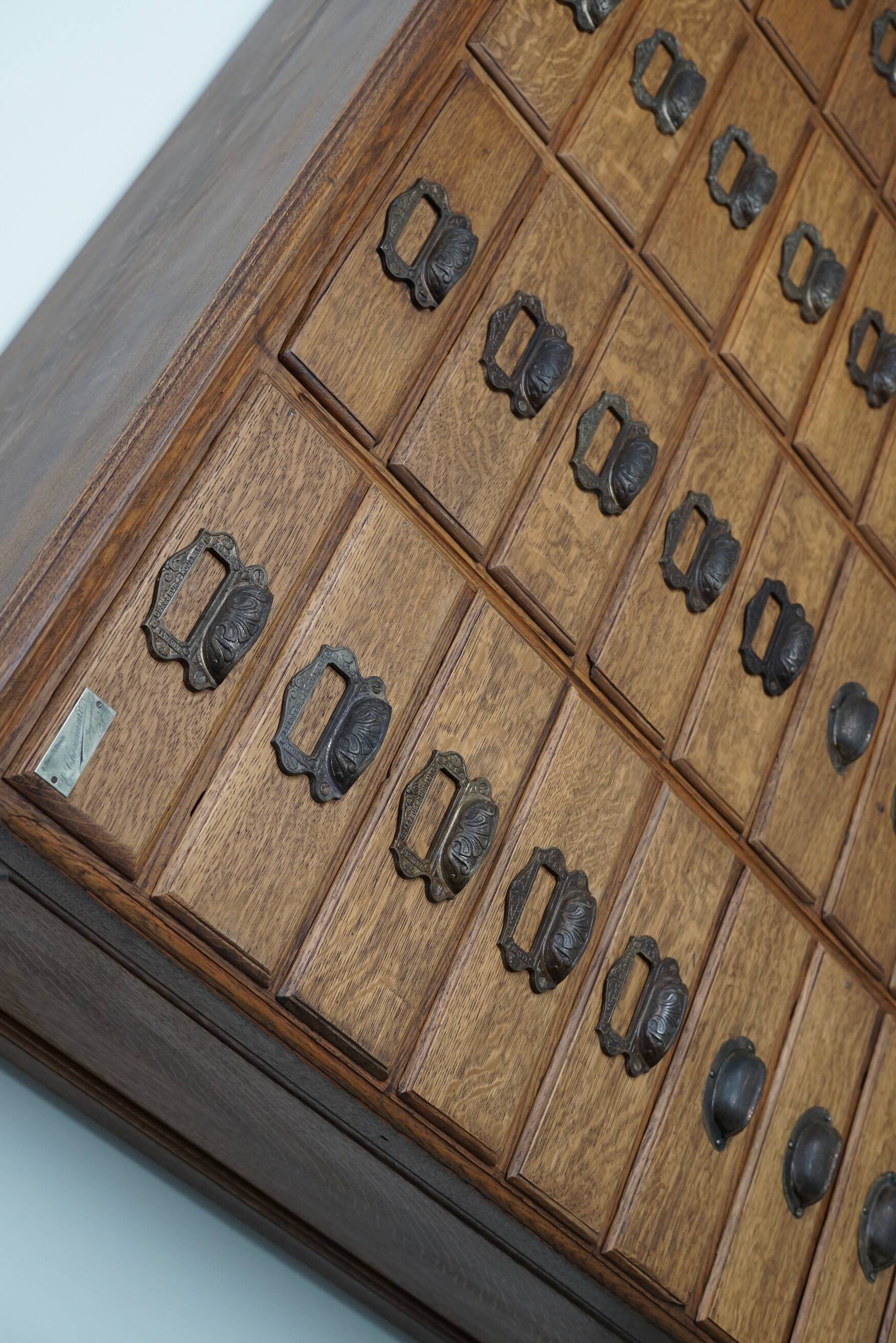Antique French oak filing / apothecary cabinet by Chouanard, ca 1910