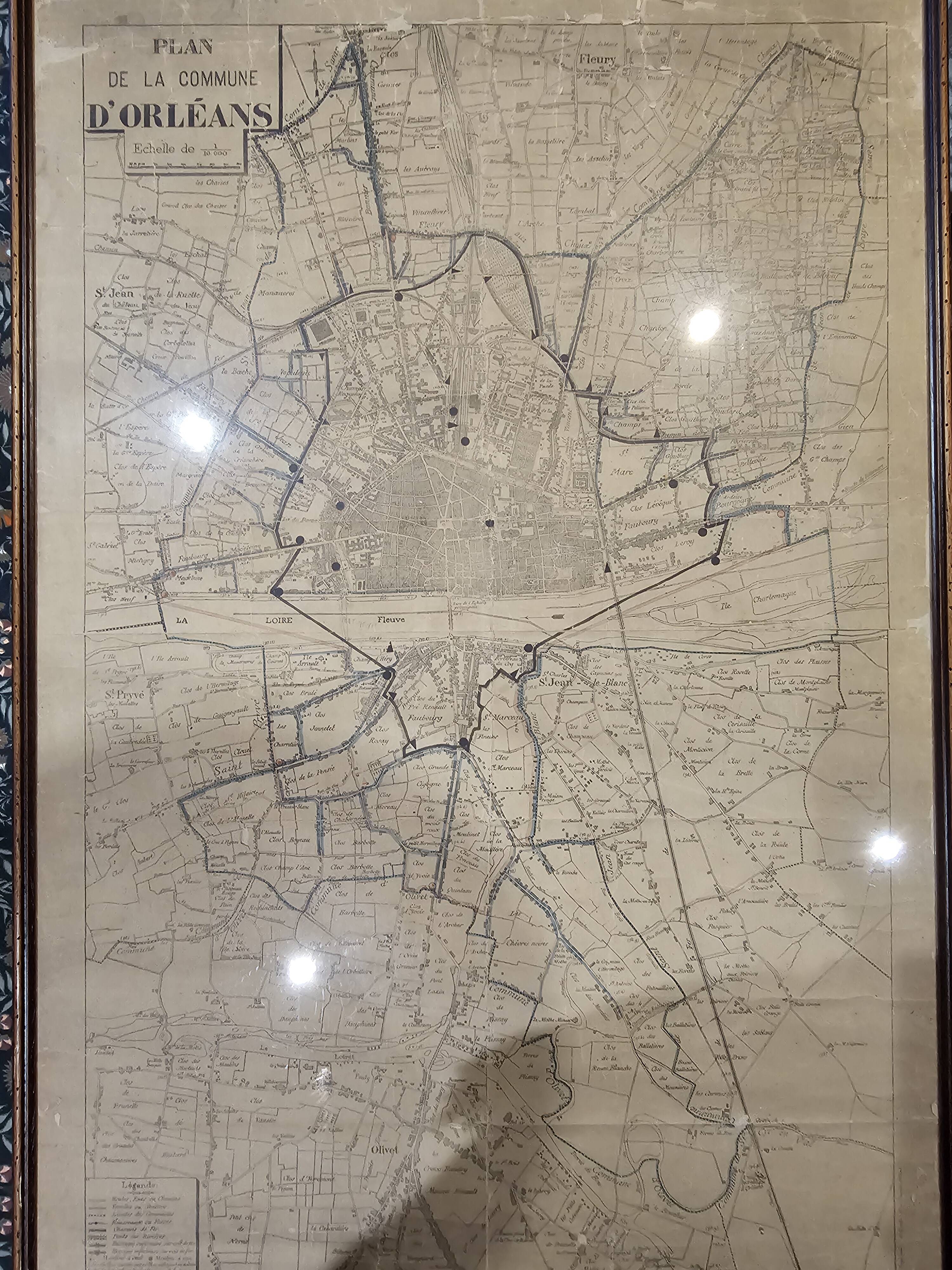 Old map of Orléans under glass frame