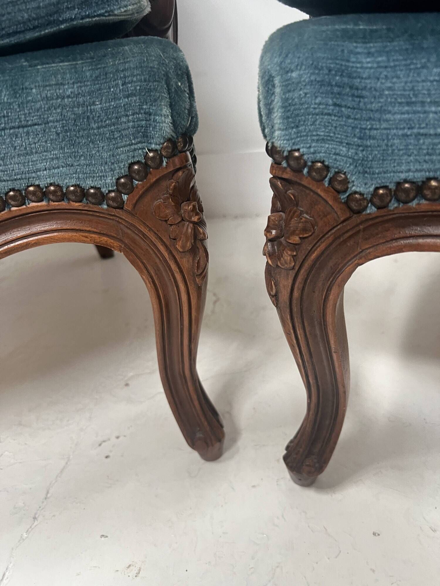 Pair of Louis XV style armchairs in natural wood, 20th century.