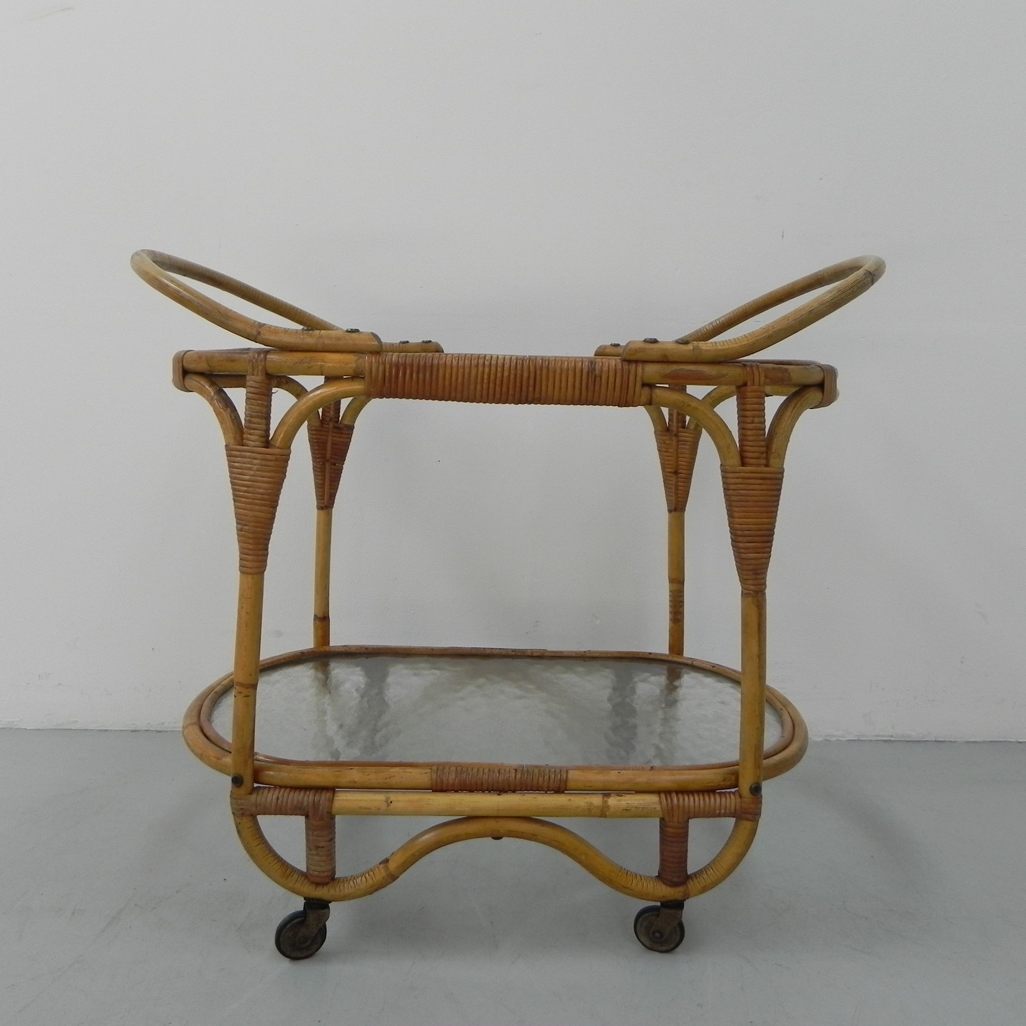 Bamboo, rattan serving trolley on castors