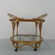 Bamboo, rattan serving trolley on castors