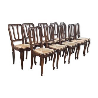 Series of 10 regency-style walnut and straw chairs around 1920