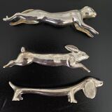 12 knife holders form various metal animals