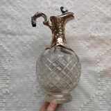 Cut crystal ewer and brass