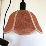 Suspension of woven fiber flowers