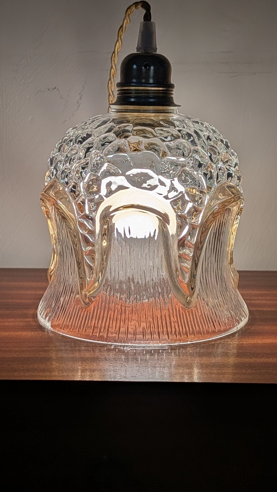Bulged glass lampshade and 6 amber arches