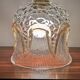 Bulged glass lampshade and 6 amber arches