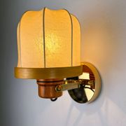 Pair of articulated "Cocoon" wall lights, resin and pine, Italy, circa 1970s