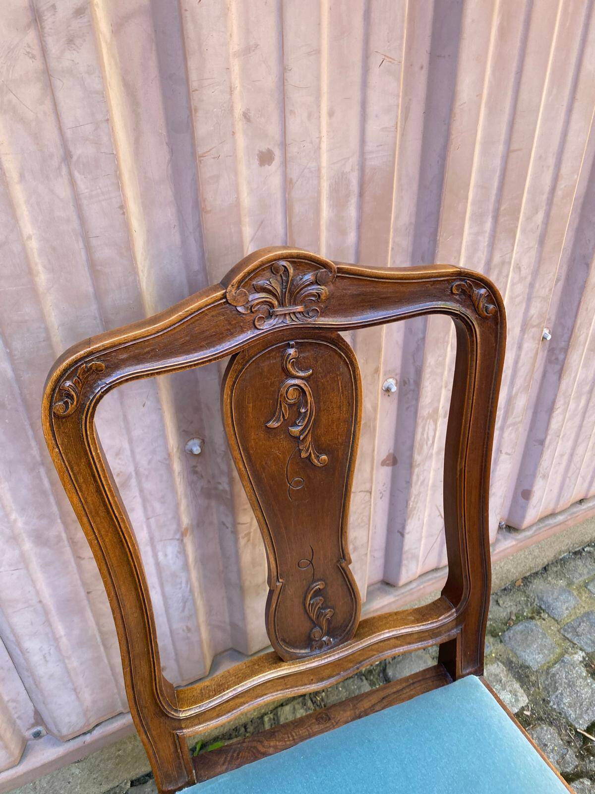 Vintage Louis XV chair made of carved solid wood with blue velvet fabric.