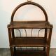 Rattan wall shelf