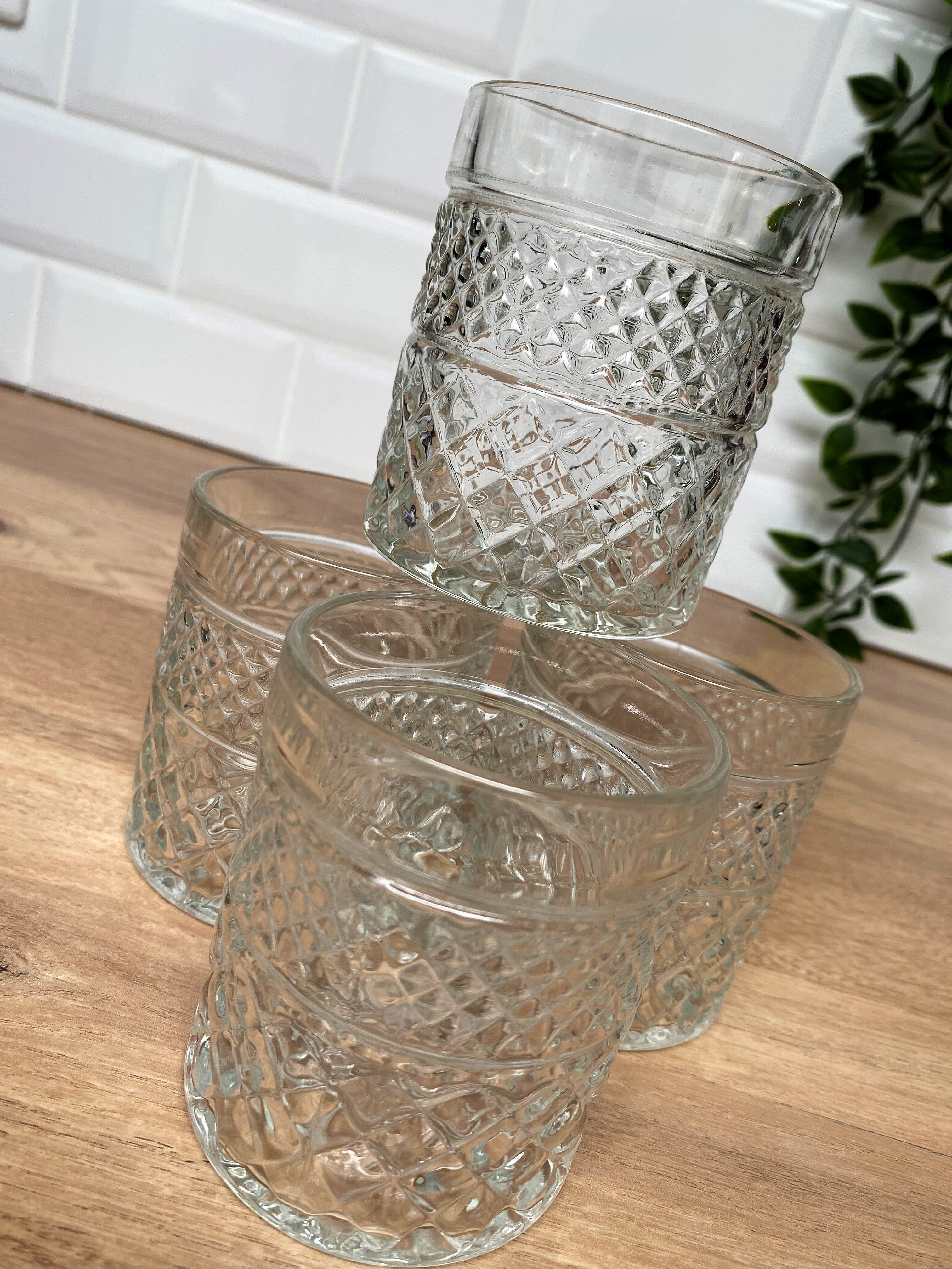 4 glasses with Whisky