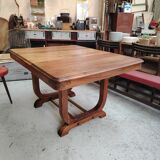Art Deco extendable table in solid wood and brass.