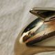 Dolphin bookends in gold metal and plexiglass – 1980s