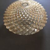 Slightly amber worked glass globe