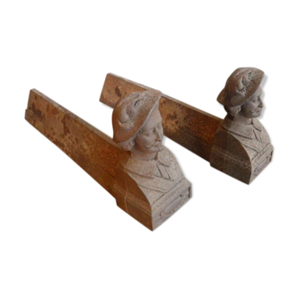 Old pair of andirons cast iron head of musketeer