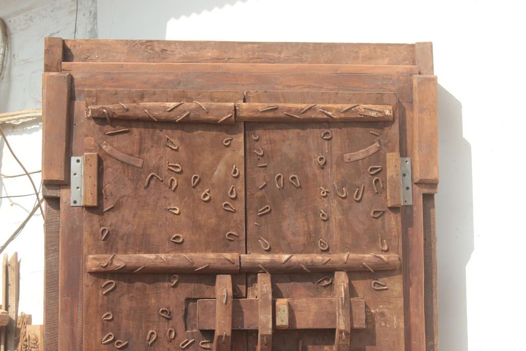 Old Indian door in old teak, piece and patina of origin