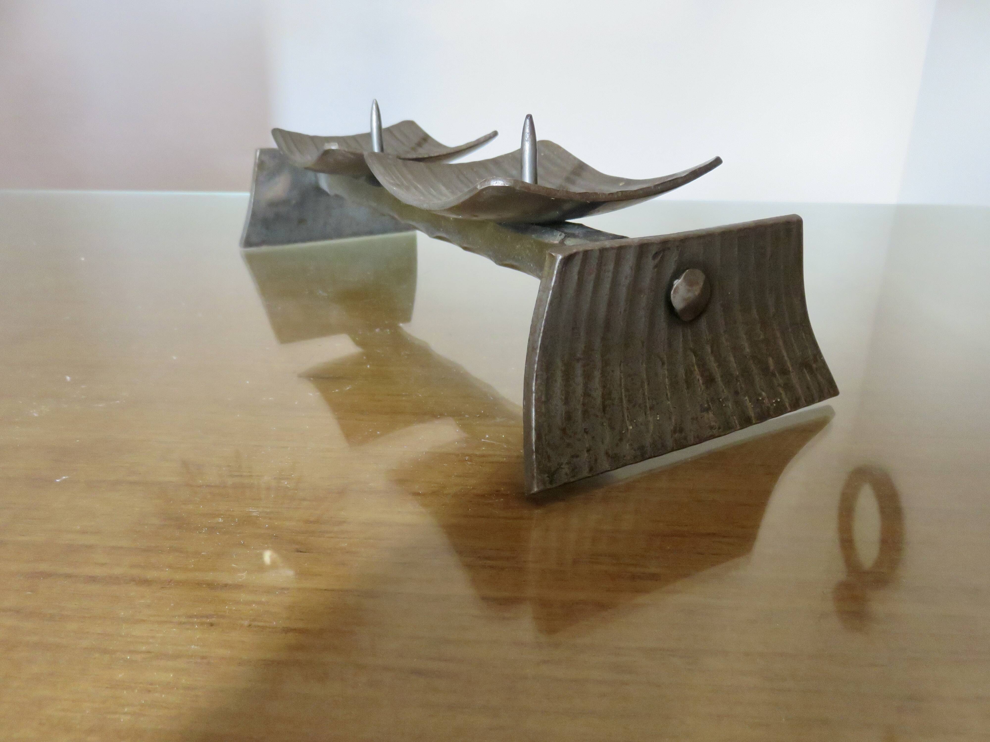 Large brutalist candlestick in the style of the Marolles workshops, raw steel.
