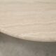 Table basse de forme courbe, travertin, France, circa 1970.