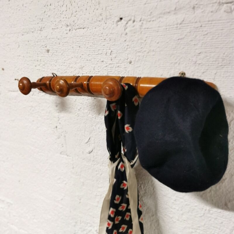 Turned wooden coat rack