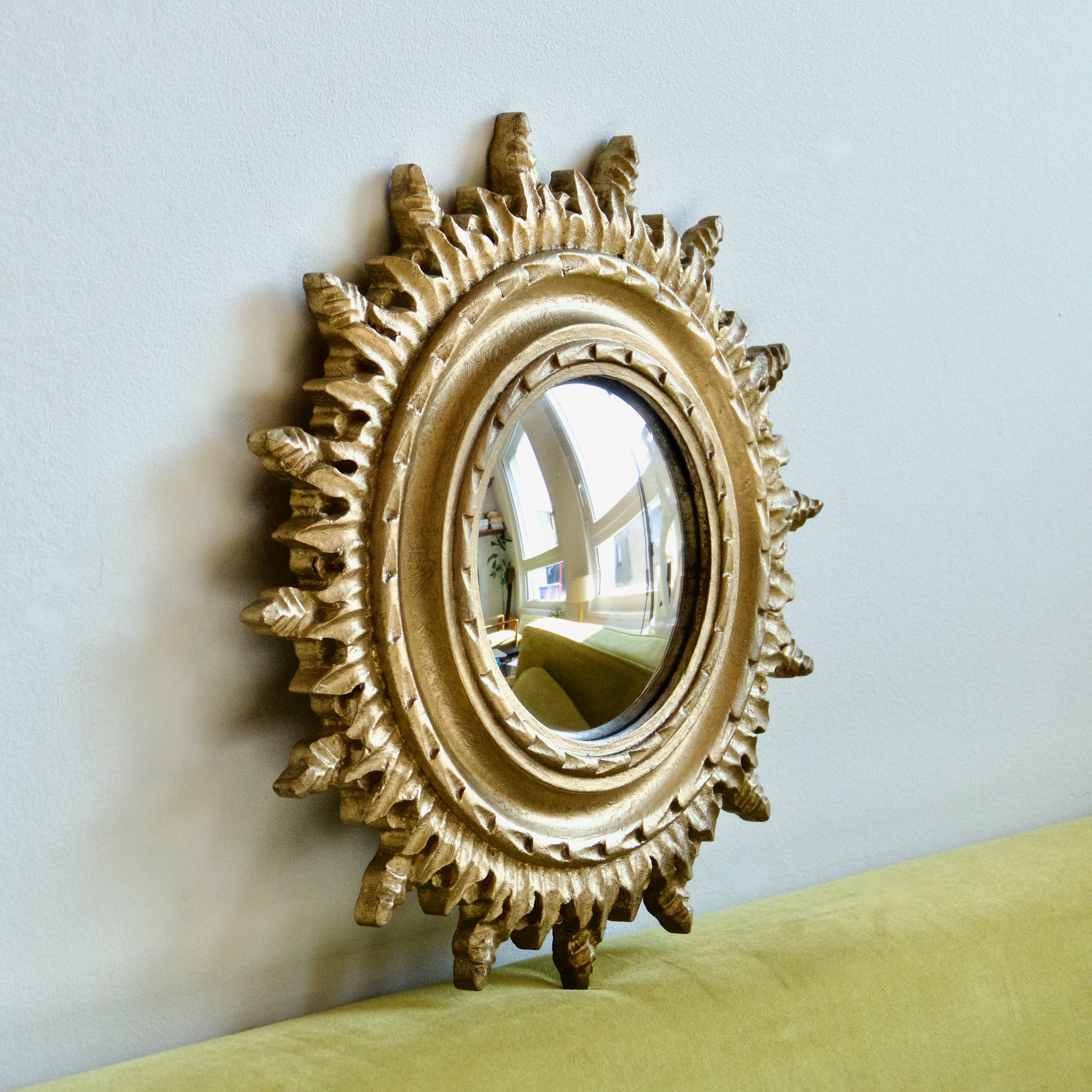 Ancien miroir doré oeil de sorcière soleil