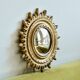 Ancien miroir doré oeil de sorcière soleil
