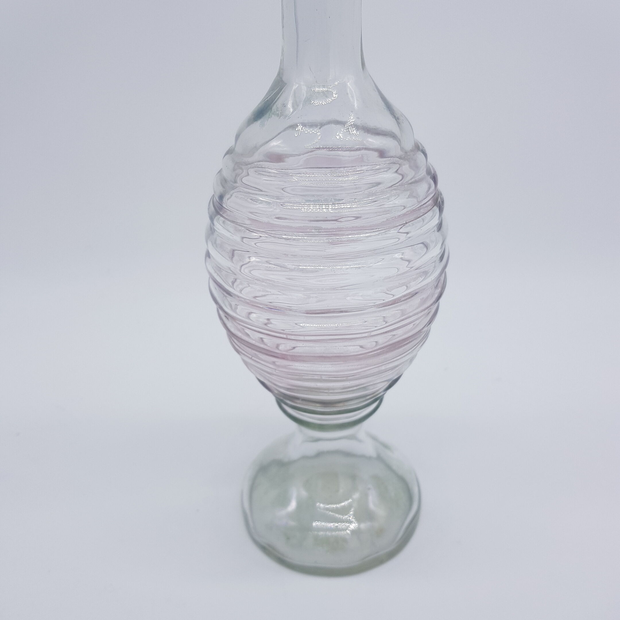 Old carafe ringed iridescent glass blown