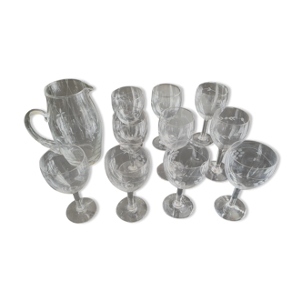 Set of 10 glasses and an engraved glass pitcher